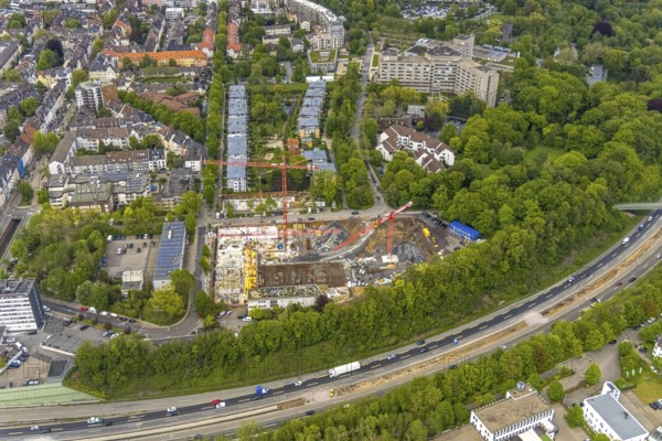 Aerial view, construction site multi-family houses Manfredstraße at the motorway A52, Essen-Rüttenscheid, Essen, Ruhr area, North Rhine-Westphalia, Germany, construction work, construction area, construction site, building plots, construction project, construction site, DE, Europe, fire station, fire brigade, aerial view, aerial photography, aerial photography, multi-family houses, apartment buildings, new construction, photovoltaic, photovoltaic system, solar, solar system, solar energy, solar energy, overview, bird's eye view, birds-eyes view, overview