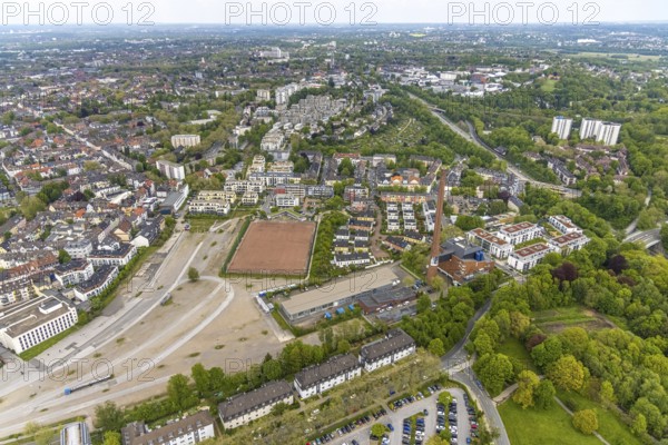 Aerial view, new development area Veronikastraße with sports field VfL Sportfreunde 07 Essen, construction area Parc Dunant, WohnQuartier, Henri-Dunant-Straße, Essen-Rüttenscheid, Essen, Ruhr area, North Rhine-Westphalia, Germany, construction area, building site, building plots, construction measure, construction project, construction site, DE, development, Europe, property tax, high-rise buildings, real estate, capacity requirements, aerial view, aerial photography, aerial photography, new construction, new construction area, overview, bird's-eye view, growth, becoming and growing, residential area, living and living, residential area, residential buildings, residential quality, residential neighbourhood, housing estate, birds-eyes view, overview