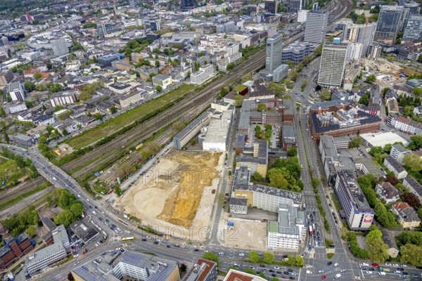 Aerial view, construction area for new literature quarter, demolition work former newspaper quarter, Südviertel, Essen, Ruhr area, North Rhine-Westphalia, Germany, expansion areas, construction work, construction, construction area, construction site, construction measure, construction project, construction site, Bert-Brecht-Straße, DE, Europe, Friedrichstraße, gastronomy, commercial buildings, hotel, capacity requirements, aerial view, aerial photography, aerial photography, new building, Sachsenstraße, overview, enlarged bird's-eye view, becoming and growing, residential complex, living and living, residential area, residential buildings, residential neighbourhood, housing shortage, birds-eyes view, new offices, new flats, new hotel, overview