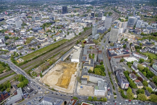 Aerial view, construction area for new literature quarter, demolition work former newspaper quarter, Südviertel, Essen, Ruhr area, North Rhine-Westphalia, Germany, expansion areas, construction work, construction, construction area, construction site, construction measure, construction project, construction site, Bert-Brecht-Straße, DE, Europe, Friedrichstraße, gastronomy, commercial buildings, hotel, capacity requirements, aerial view, aerial photography, aerial photography, new building, Sachsenstraße, overview, enlarged bird's-eye view, becoming and growing, residential complex, living and living, residential area, residential buildings, residential neighbourhood, housing shortage, birds-eyes view, new offices, new flats, new hotel, overview