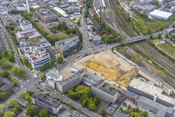 Aerial view, construction area for new literature quarter, demolition work former newspaper quarter, Südviertel, Essen, Ruhr area, North Rhine-Westphalia, Germany, expansion areas, construction work, construction, construction area, construction site, construction measure, construction project, construction site, Bert-Brecht-Straße, DE, Europe, Friedrichstraße, gastronomy, commercial buildings, hotel, capacity requirements, aerial view, aerial photography, aerial photography, new building, Sachsenstraße, overview, enlarged bird's-eye view, becoming and growing, residential complex, living and living, residential area, residential buildings, residential neighbourhood, housing shortage, birds-eyes view, new offices, new flats, new hotel, overview