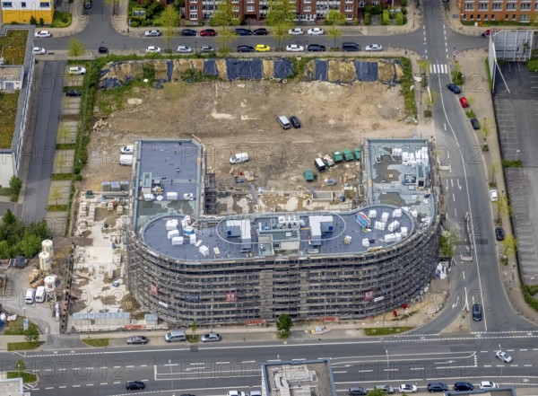 Aerial view, construction site and new office building on the corner of Frohnhauser Straße and Kurt-Jooss-Straße, City, Westviertel, Essen, Ruhr area, North Rhine-Westphalia, Germany, construction work, construction area, construction site, building plots, construction project, construction site, DE, Europe, aerial view, aerial photography, aerial photography, new building, overview, bird's-eye view, bird's-eye view, overview