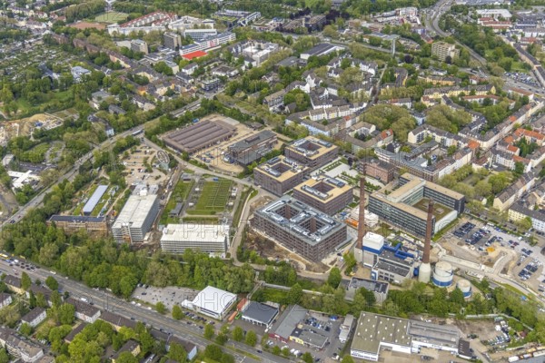 Aerial view, construction site at RWE Campus, Nordviertel, Essen, Ruhr area, North Rhine-Westphalia, Germany, construction work, construction, construction vehicles, construction area, construction site, construction crane, construction measure, construction project, construction site, DE, energy supply company, renewal, development, Europe, capacity requirements, aerial view, aerial photography, aerial photography, new construction, RWE, RWE Supply & Trading, Rheinisch-Westfälisches Elektrizitätswerk, overview, enlargement bird's-eye view, becoming and growing, birds-eyes view, overview