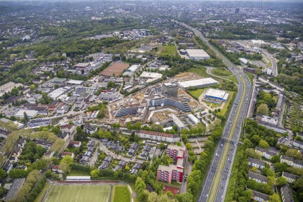 Aerial view, new construction and construction site ALDI-Nord Campus, Eckenbergstraße, Hängebank, Essen-Kray, Essen, Ruhr area, North Rhine-Westphalia, Germany, construction work, construction area, building site, building plots, construction crane, construction project, construction site, DE, development, Europe, commercial enterprises, commercial area, commercial park, commercial site, commercial use, industrial site, aerial photograph, aerial photography, aerial photography, new construction, overview, bird's eye view, bird's eye view, overview
