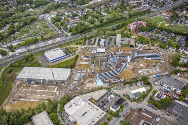 Aerial view, new construction and construction site ALDI-Nord Campus, Eckenbergstraße, Hängebank, Essen-Kray, Essen, Ruhr area, North Rhine-Westphalia, Germany, construction work, construction area, building site, building plots, construction crane, construction project, construction site, DE, development, Europe, commercial enterprises, commercial area, commercial park, commercial site, commercial use, industrial site, aerial photograph, aerial photography, aerial photography, new construction, overview, bird's eye view, bird's eye view, overview