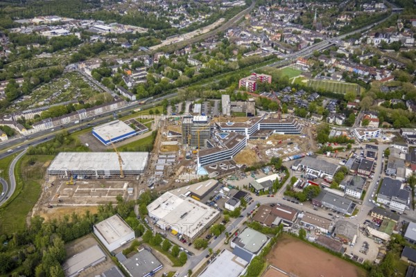 Aerial view, new construction and construction site ALDI-Nord Campus, Eckenbergstraße, Hängebank, Essen-Kray, Essen, Ruhr area, North Rhine-Westphalia, Germany, construction work, construction area, building site, building plots, construction crane, construction project, construction site, DE, development, Europe, commercial enterprises, commercial area, commercial park, commercial site, commercial use, industrial site, aerial photograph, aerial photography, aerial photography, new construction, overview, bird's eye view, bird's eye view, overview