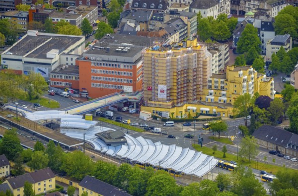 Aerial photo, construction site Kaiser-Otto-Residenz Essen, railway and bus station Steeler Platz, Essen-Steele, Essen, Ruhr area, North Rhine-Westphalia, Germany, retirement home, retirement home, station, construction work, construction area, building site, building plots, construction project, construction site, care and nursing, DE, Deutsche Bahn AG, Europe, main station, aerial view, aerial photography, aerial photography, care facility, S-Bahn, Scheidtmanntor, retirement home, retirement residence, retirement home, senior centre, overview, bird's eye view, ZOB, birds-eyes view, futuristic roofing, overview