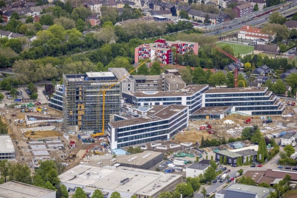 Aerial view, new construction and construction site ALDI-Nord Campus, Eckenbergstraße, Hängebank, Essen-Kray, Essen, Ruhr area, North Rhine-Westphalia, Germany, construction work, construction area, building site, building plots, construction crane, construction project, construction site, DE, development, Europe, commercial enterprises, commercial area, commercial park, commercial site, commercial use, industrial site, aerial photograph, aerial photography, aerial photography, new construction, overview, bird's eye view, bird's eye view, overview
