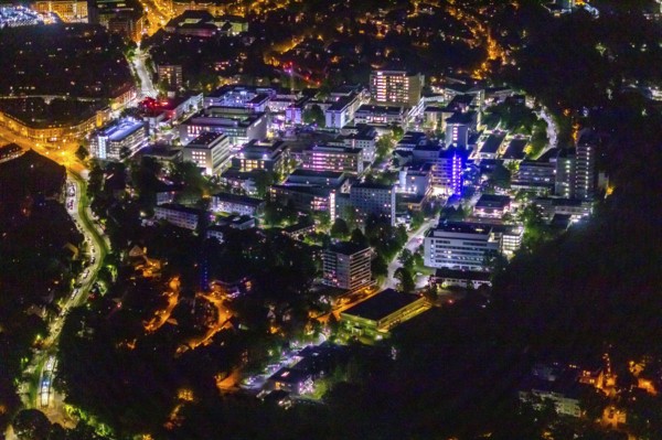 Aerial photograph, University Hospital Essen, Essen-Holsterhausen, Essen, Ruhr area, North Rhine-Westphalia, Germany, outdoor lighting, DE, twilight, Europe, healthcare, hospital, clinic, clinic centre, hospital, light pollution, aerial photograph, aerial photography, aerial photography, medical facility, medical aid, night aerial photograph, streetlights, street lamps, overview, bird's eye view, illuminated, illuminated houses, illuminated house, birds-eyes view, artificial light, night, nightflight, overview, medical care