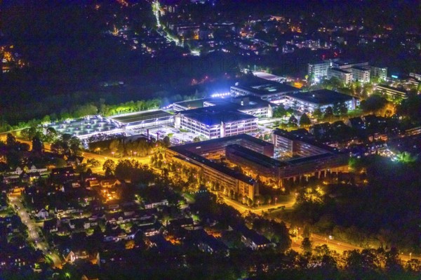 Aerial photograph, Bredeney office park, Karstadt headquarters, Essen police, Essen-Bredeney, Essen, Ruhr area, North Rhine-Westphalia, Germany, surveillance, eye of the law, outdoor lighting, DE, twilight, Europe, commercial buildings, light pollution, aerial photograph, aerial photography, aerial photography, night aerial photography, law enforcement officer, police, police station, police station, state authority, state power, streetlights, street lamps, overview, bird's eye view, illuminated, illuminated houses, illuminated house, birds-eyes view, artificial light, night, nightflight, overview