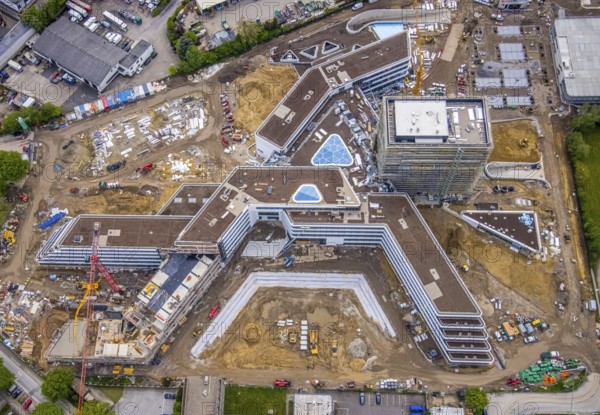 Aerial view, new construction and construction site ALDI-Nord Campus, in A-form, Eckenbergstraße, Hängebank, Essen-Kray, Essen, Ruhr area, North Rhine-Westphalia, Germany, construction work, construction area, building site, building plots, construction crane, construction project, construction site, DE, development, Europe, commercial enterprises, commercial area, industrial estate, commercial park, commercial site, commercial use, industrial site, aerial view, aerial photography, aerial photography, new construction, overview, bird's-eye view, birds-eyes view, overview