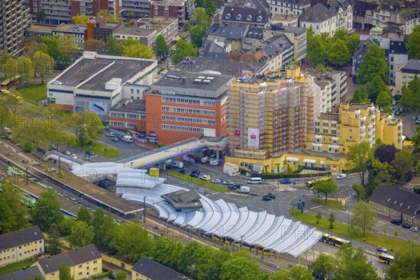 Aerial photo, construction site Kaiser-Otto-Residenz Essen, railway and bus station Steeler Platz, Essen-Steele, Essen, Ruhr area, North Rhine-Westphalia, Germany, retirement home, retirement home, station, construction work, construction area, building site, building plots, construction project, construction site, care and nursing, DE, Deutsche Bahn AG, Europe, main station, aerial view, aerial photography, aerial photography, care facility, S-Bahn, Scheidtmanntor, retirement home, retirement residence, retirement home, senior centre, overview, bird's eye view, ZOB, birds-eyes view, futuristic roofing, overview