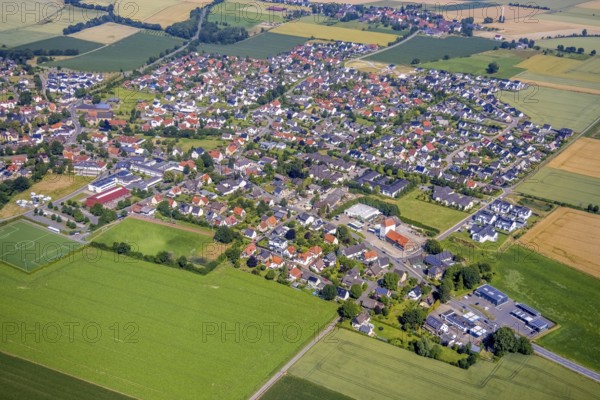 Aerial view, meadows and fields with local view Bremen, Ense, Sauerland, North Rhine-Westphalia, Germany, DE, Europe, property tax, real estate, aerial view, aerial photography, aerial photography, overview, bird's eye view, living and life, residential buildings, quality of living, birds-eyes view, overview