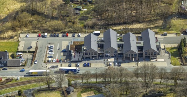Aerial view, shopping centre on the B62, Erndtebrück, Siegerland, North Rhine-Westphalia, Germany, railway tracks, federal road B62, DE, shopping, shopping centre, shopping markets, shopping place, shopping centre, Europe, aerial view, aerial photography, aerial photography, local supply centre, overview, bird's-eye view, overview