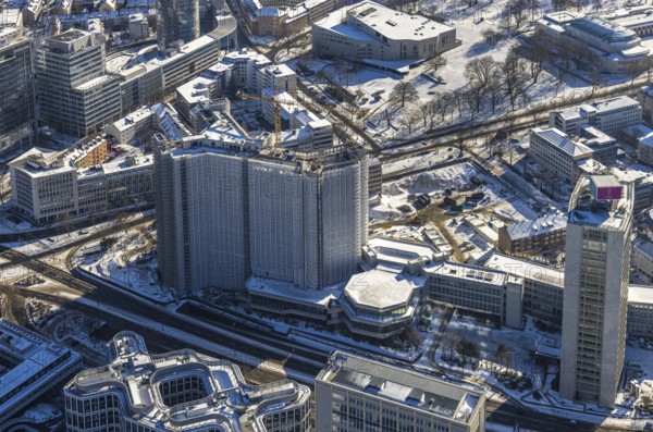 Aerial view, innogy high-rise building, construction site demolition RWE Haus, Westviertel, Essen, Ruhr area, North Rhine-Westphalia, Germany, demolition work, City, DE, Europe, Huyssenallee, city centre, aerial view, aerial photography, aerial photography, snow, city centre, overview, bird's eye view, winter, Ypsilon-Haus, birds-eyes view, overview