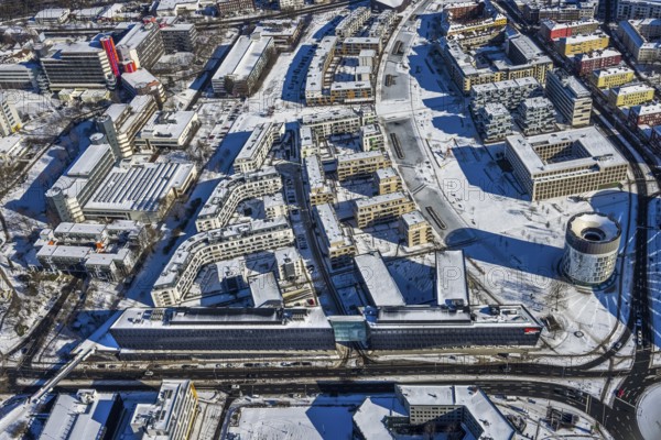 Aerial view, Funke Mediengruppe headquarters, Jakob-Funke-Platz 1, Berliner Platz, university quarter Grüne Mitte Essen, Rheinische Straße, Westviertel, Essen, Ruhr area, North Rhine-Westphalia, Germany, DE, development, Europe, Funke Mediengruppe, Grüne Mitte Essen, aerial view, aerial photography, aerial photography, media house, snow, tower WAZ/NRZ-LeserLaden Kiosk Essen, overview, bird's-eye view, winter, newspaper publisher, birds-eyes view, overview