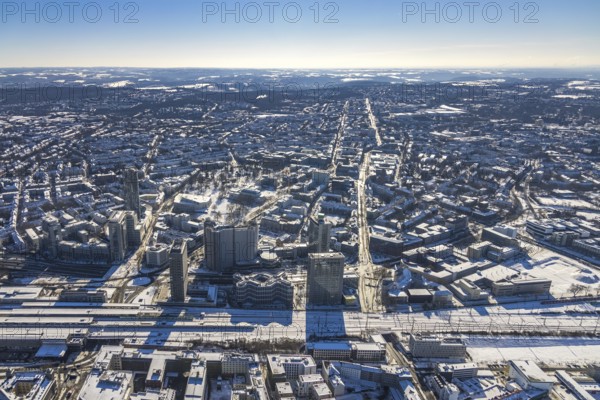Aerial view, innogy high-rise building, construction site demolition RWE Haus, city centre, Essen, Ruhr area, North Rhine-Westphalia, Germany, demolition work, City, DE, Europe, Huyssenallee, city centre, aerial view, aerial photography, aerial photography, snow, skyline, city centre, overview, bird's eye view, winter, Ypsilon-Haus, birds-eyes view, overview