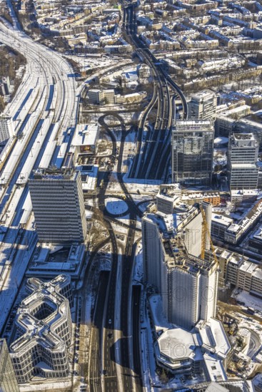 Aerial view, innogy high-rise building, construction site demolition RWE Haus, Südviertel, Essen, Ruhr area, North Rhine-Westphalia, Germany, demolition work, City, DE, Europe, Huyssenallee, city centre, roundabout, roundabout, aerial view, aerial photography, aerial photography, snow, city centre, overview, bird's eye view, winter, Ypsilon-Haus, birds-eyes view, overview