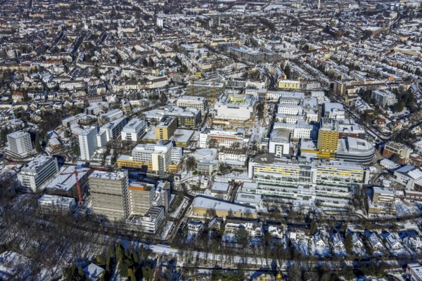 Aerial view, city view, University of Duisburg-Essen, University Hospital, Essen-Rüttenscheid, Essen, Ruhr area, North Rhine-Westphalia, Germany, DE, Europe, healthcare, hospital, clinic, clinic centre, hospital, aerial view, aerial photography, aerial photography, medical facility, medical aid, emergency service, snow, overview, bird's eye view, winter, birds-eyes view, overview, medical care