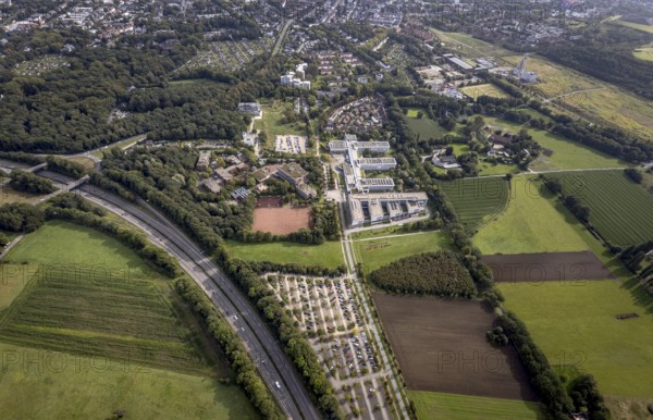 Aerial view, Westfälische Hochschule and Hans-Schwier-Berufskolleg in the district of Buer in Gelsenkirchen, Ruhr area, North Rhine-Westphalia, Germany, vocational school, education, educational institution, DE, Devesche Feld, Europe, Gelsenkirchen, community garden, college, KGV, allotment garden, allotment garden site, allotment garden association, allotment garden association recreation Buer, allotment gardener association, college school, teaching institute, aerial view, aerial photography, aerial photography, allotment garden, special school, overview, bird's eye view, housing estate Angerburger Straße, birds-eyes view, overview