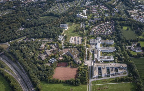 Aerial view, Westfälische Hochschule and Hans-Schwier-Berufskolleg in the district of Buer in Gelsenkirchen, Ruhr area, North Rhine-Westphalia, Germany, vocational school, education, educational institution, DE, Devesche Feld, Europe, Gelsenkirchen, community garden, college, KGV, allotment garden, allotment garden site, allotment garden association, allotment garden association recreation Buer, allotment gardener association, college school, teaching institute, aerial view, aerial photography, aerial photography, allotment garden, special school, overview, bird's eye view, housing estate Angerburger Straße, birds-eyes view, overview