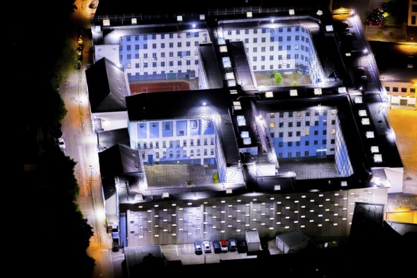 Aerial view, Essen Prison, Essen-Rüttenscheid, Essen, Ruhr area, North Rhine-Westphalia, Germany, detention, outdoor lighting, DE, twilight, Europe, imprisonment, prison, detention centre, prison sentence, correctional facility, light pollution, aerial photography, aerial photography, night aerial photography, streetlights, street lamps, overview, custody, bird's-eye view, illuminated, illuminated houses, illuminated house, birds-eyes view, artificial light, night, nightflight, overview