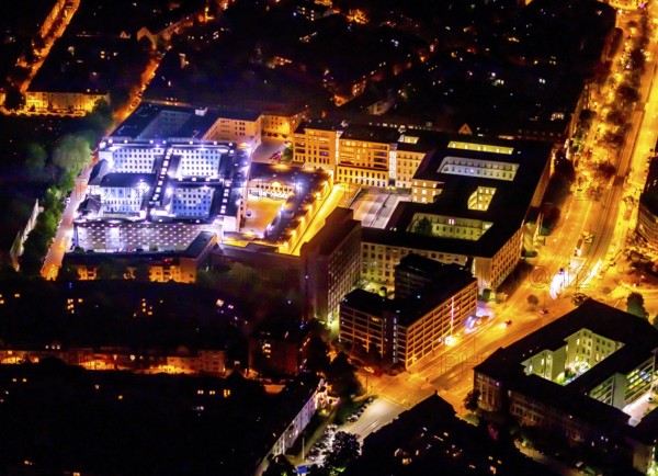 Aerial photograph, Essen District Court and Local Court, Essen Prison, Essen-Rüttenscheid, Essen, Ruhr area, North Rhine-Westphalia, Germany, local court, arrest, outdoor lighting, authority, DE, twilight, Europe, deprivation of liberty, prison, custody, detention centre, prison sentence, correctional facility, light pollution, aerial photograph, aerial photography, aerial photography, night aerial photograph, streetlights, street lamps, overview, custody, bird's eye view, illuminated, illuminated houses, illuminated house, birds-eyes view, artificial light, night, nightflight, overview