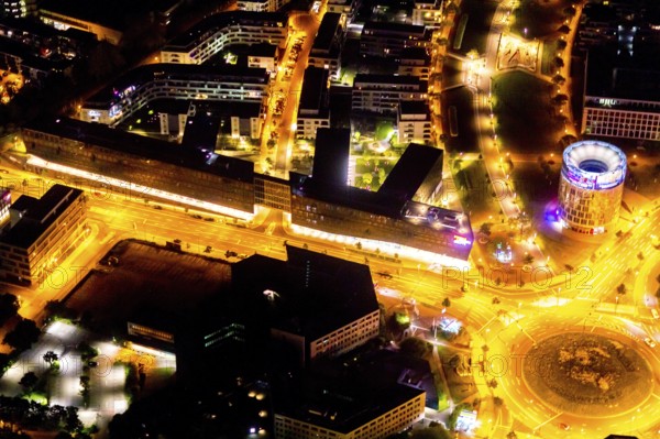 Aerial view, Berliner Platz, Funke Mediengruppe, Westviertel, Essen, Ruhr area, North Rhine-Westphalia, Germany, outdoor lighting, DE, twilight, shopping centre, shopping square, shopping mall, Europe, light pollution, aerial view, aerial photography, aerial photography, media house, media company, night aerial photography, shopping, shopping centre, streetlights, street lamps, overview, publishing house, publishing industry, bird's-eye view, illuminated, illuminated houses, illuminated house, birds-eyes view, artificial light, night, nightflight, overview