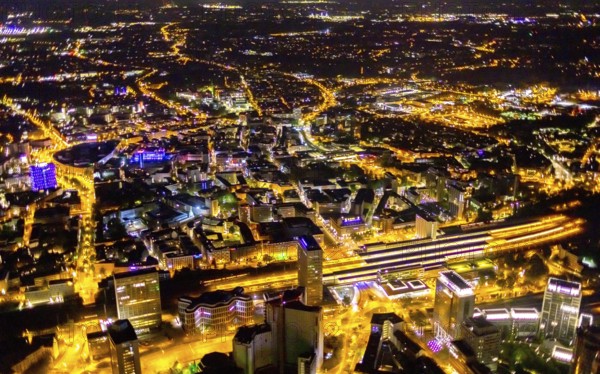 Aerial view, Essen central station, southern district, Essen, Ruhr area, North Rhine-Westphalia, Germany, outdoor lighting, railway station, DE, Deutsche Bahn AG, twilight, Europe, commercial buildings, central station, main station, light pollution, aerial photograph, aerial photography, aerial photography, night aerial photograph, streetlights, street lamps, overview, bird's eye view, illuminated, illuminated houses, illuminated house, birds-eyes view, artificial light, night, nightflight, overview
