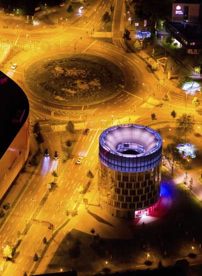 Aerial view, Funke Kiosk Tower at Berliner Platz, Westviertel, Essen, Ruhr area, North Rhine-Westphalia, Germany, outdoor lighting, DE, twilight, shopping centre, shopping square, shopping mall, Europe, light pollution, aerial photography, aerial photography, night aerial photography, shopping, shopping centre, streetlights, street lamps, overview, bird's eye view, illuminated, illuminated houses, illuminated house, birds-eyes view, artificial light, night, nightflight, overview