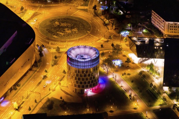 Aerial view, Funke Kiosk Tower at Berliner Platz, Westviertel, Essen, Ruhr area, North Rhine-Westphalia, Germany, outdoor lighting, DE, twilight, shopping centre, shopping square, shopping mall, Europe, light pollution, aerial photography, aerial photography, night aerial photography, shopping, shopping centre, streetlights, street lamps, overview, bird's eye view, illuminated, illuminated houses, illuminated house, birds-eyes view, artificial light, night, nightflight, overview