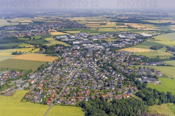 Aerial view, industrial park Höingen and local view Höingen, Ense, Sauerland, North Rhine-Westphalia, Germany, DE, Europe, commercial enterprises, commercial area, commercial area, commercial location, commercial use, property tax, Höinger Heide, real estate, industrial area, industrial location, aerial photograph, aerial photography, aerial photography, overview, bird's-eye view, living and life, residential area, residential buildings, quality of life, birds-eyes view, overview