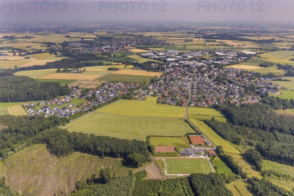 Aerial view, forest area Fürstenberg and Höinger Heide with forest damage, sports field Höingen, Ense, Sauerland, North Rhine-Westphalia, Germany, tree death, bark beetle damage, bark beetle plague, DE, Europe, football pitch, football stadium, clear-cutting, aerial photography, aerial photography, aerial photography, sports, sports facilities, sports field, sports shooting, sports facility, tennis, tennis facility, tennis courts, drought, overview, bird's-eye view, forest, forest damage, forest damage, forest dieback, birds-eyes view, overview