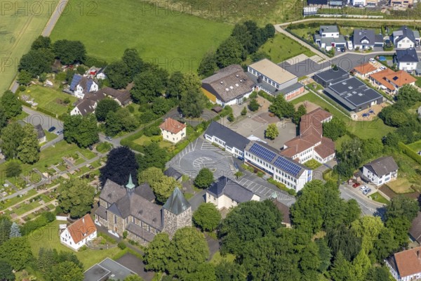Aerial view, Church of St. Bernhard and Bernhardus School, Niederense, Ense, Sauerland, North Rhine-Westphalia, Germany, place of worship, education, educational institution, DE, Europe, religious community, place of worship, primary school, holy place, church, parish, denomination, educational institute, aerial view, aerial photography, aerial photography, photovoltaics, photovoltaic system, religion, religious site, school, solar, solar system, solar energy, solar energy, overview, bird's-eye view, bird's-eye view, overview