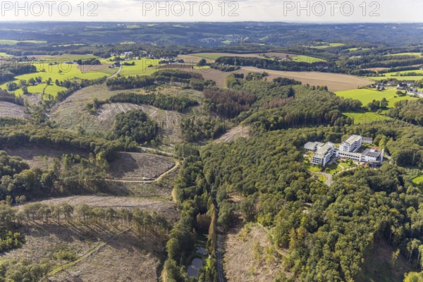 Aerial photo, Königsfeld Rehabilitation Clinic and forest damage in the Windgarten district of Ennepetal, Ruhr area, North Rhine-Westphalia, Germany, tree death, bark beetle damage, bark beetle plague, DE, Ennepetal, Europe, spruce death, health care, hospital, clear-cutting, clinic, hospital, hospital centre, hospital, aerial view, aerial photography, aerial photography, medical facility, medical aid, rehab clinic, overview, bird's-eye view, forest, forest damage, forest dieback, birds-eyes view, overview, medical care