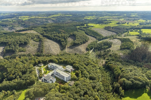 Aerial photo, Königsfeld Rehabilitation Clinic and forest damage in the Windgarten district of Ennepetal, Ruhr area, North Rhine-Westphalia, Germany, tree death, bark beetle damage, bark beetle plague, DE, Ennepetal, Europe, spruce death, health care, hospital, clear-cutting, clinic, hospital, hospital centre, hospital, aerial view, aerial photography, aerial photography, medical facility, medical aid, rehab clinic, overview, bird's-eye view, forest, forest damage, forest dieback, birds-eyes view, overview, medical care