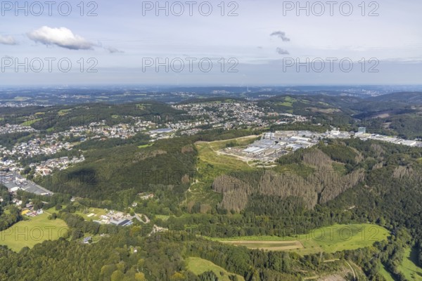 Aerial view, commercial area Jacobstraße with Siegfried Jacob Metallwerke and landfill in the district Voerde in Ennepetal, Ruhr area, North Rhine-Westphalia, Germany, tree mortality, bark beetle damage, bark beetle plague, DE, landfill, Ennepetal, Europe, spruce mortality, commercial enterprises, commercial area, commercial park, commercial site, commercial use, industrial area, industrial site, clear-cutting, aerial view, aerial photography, aerial photography, overview, bird's-eye view, forest, forest area, forest damage, forest damage, forest dieback, birds-eyes view, overview