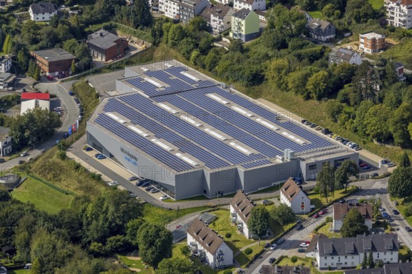 Aerial view, commercial area bilstein group Engineering with solar roof in the district Voerde in Ennepetal, Ruhr area, North Rhine-Westphalia, Germany, DE, Ennepetal, Europe, commercial enterprises, commercial area, commercial location, commercial use, industrial area, industrial building, industrial location, aerial view, aerial photography, aerial photography, photovoltaic, photovoltaic system, solar system, solar roof, solar energy, overview, bird's eye view, birds-eyes view, overview
