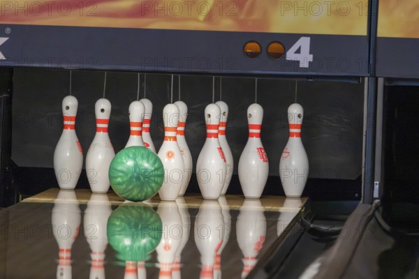 Bowling: Ball rolls towards the bowling pins