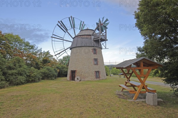 Dutch windmill built in 1831 and covered bench with table, Holländer-Windmühle, Eckartsberga, Saxony-Anhalt, Germany