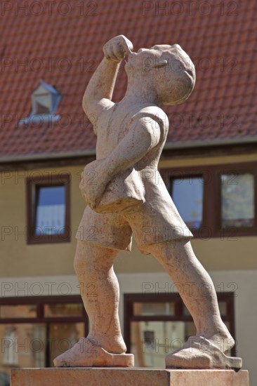 Juice boy at the market fountain, symbolising the historical supply of drinking water, boy drinking, market, Zörbig, Saxony-Anhalt, Germany