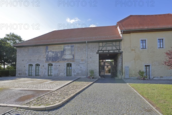 Castle built 16th century with banner for the celebration and anniversary of the bell, city administration, monument, city history, castle, Apolda, Thuringia, Germany