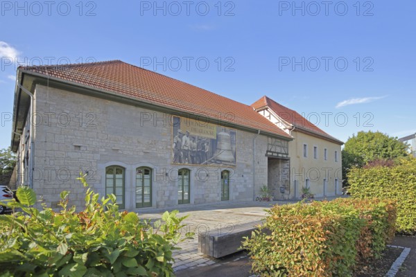 Castle built 16th century with banner for the celebration and anniversary of the bell, city administration, monument, city history, castle, Apolda, Thuringia, Germany