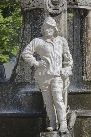 Miner at the market fountain, male figure with hammer and helmet, symbol, industry, sculpture, detail, market square, Schönebeck, Saxony-Anhalt, Germany