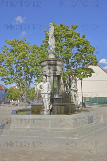 Market fountain with allegorical sculptures on the town's history, market square, Schönebeck, Saxony-Anhalt, Germany