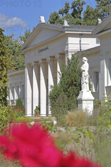 Classicist lime tree bath with columns, blooming flower, depth of field, blur, saltwater park, spa gardens, Bad Salzelmen, Schönebeck, Saxony-Anhalt, Germany