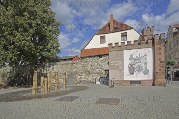 Historic Hague Gate and part of the former town wall, fountain, Haldensleben, Saxony-Anhalt, Germany