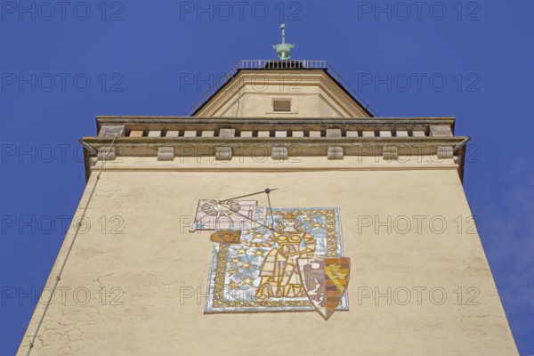 Tower with town coat of arms and sundial, wall mosaic, figure with shield and crown, view upwards, detail, town hall, Coswig, Fläming, Saxony-Anhalt, Germany