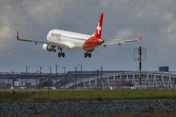Aircraft approaching Stuttgart Airport. Aircraft registration: HB-JVJ, Helvetic Airways, Embraer ERJ-195, Stuttgart, Baden-Württemberg, Germany