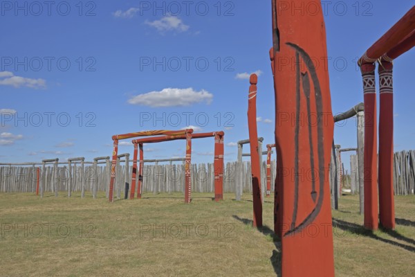 Archaeological reconstructed circular ditch from the Stone Age, Bronze Age, poles with runes, bow and arrow, ring ditches, reconstruction, wooden beams, wooden poles, palisades, symbols, signs, ring sanctuary, Pömmelte, Zackmünde, Barby, Saxony-Anhalt, Germany